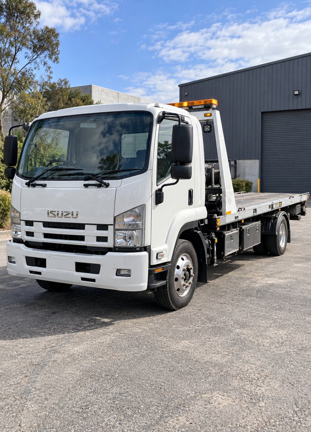 Isuzu tilt tray tow truck financed by TAFS