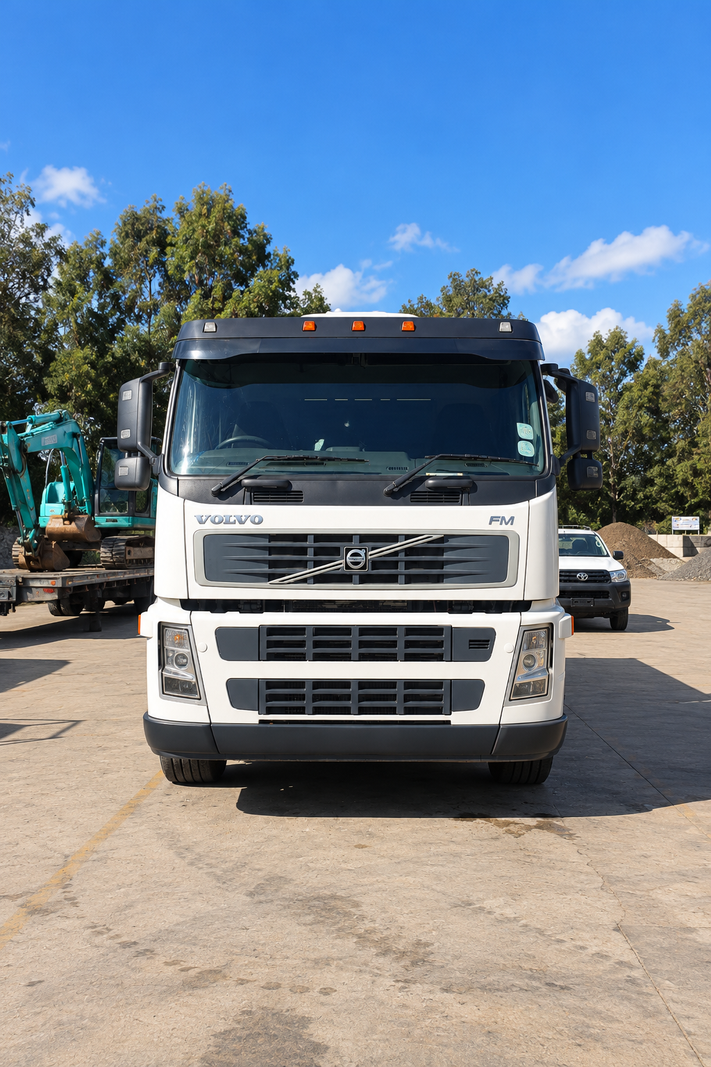 Front-Facing Volvo FM in an Industrial Yard